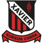 The Xavier Meat Processing logo featuring a shield and banner, representing quality and tradition in meat craftsmanship.